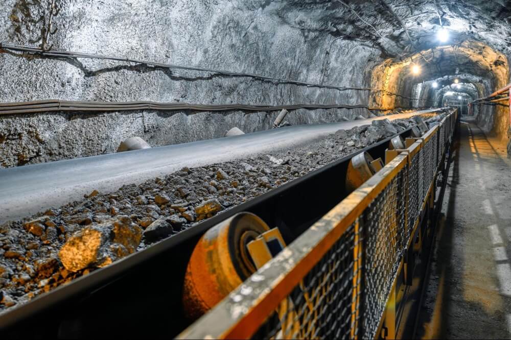 A belt conveyor for mining in an underground environment.