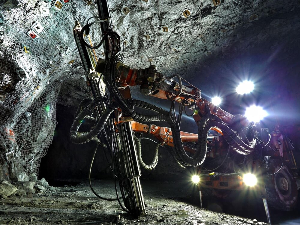 Underground vehicle used to support ceilings in a mine.